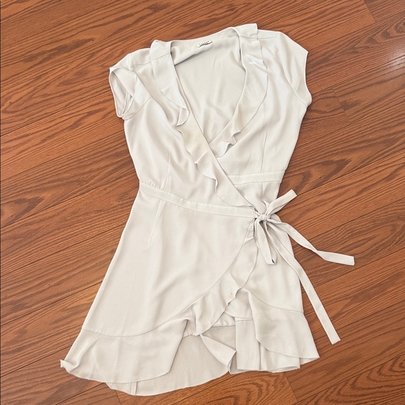 Sunday Best Dresses & Skirts - Sunday Best Cream Ruffle Wrap Dress
